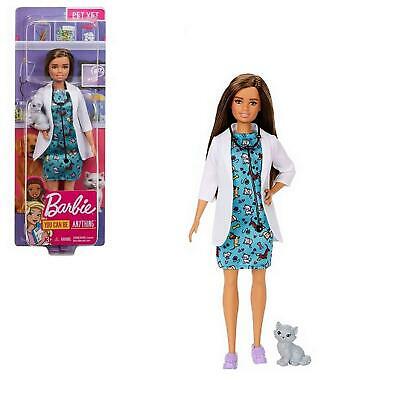 Barbie doll with stethoscope and gray cat